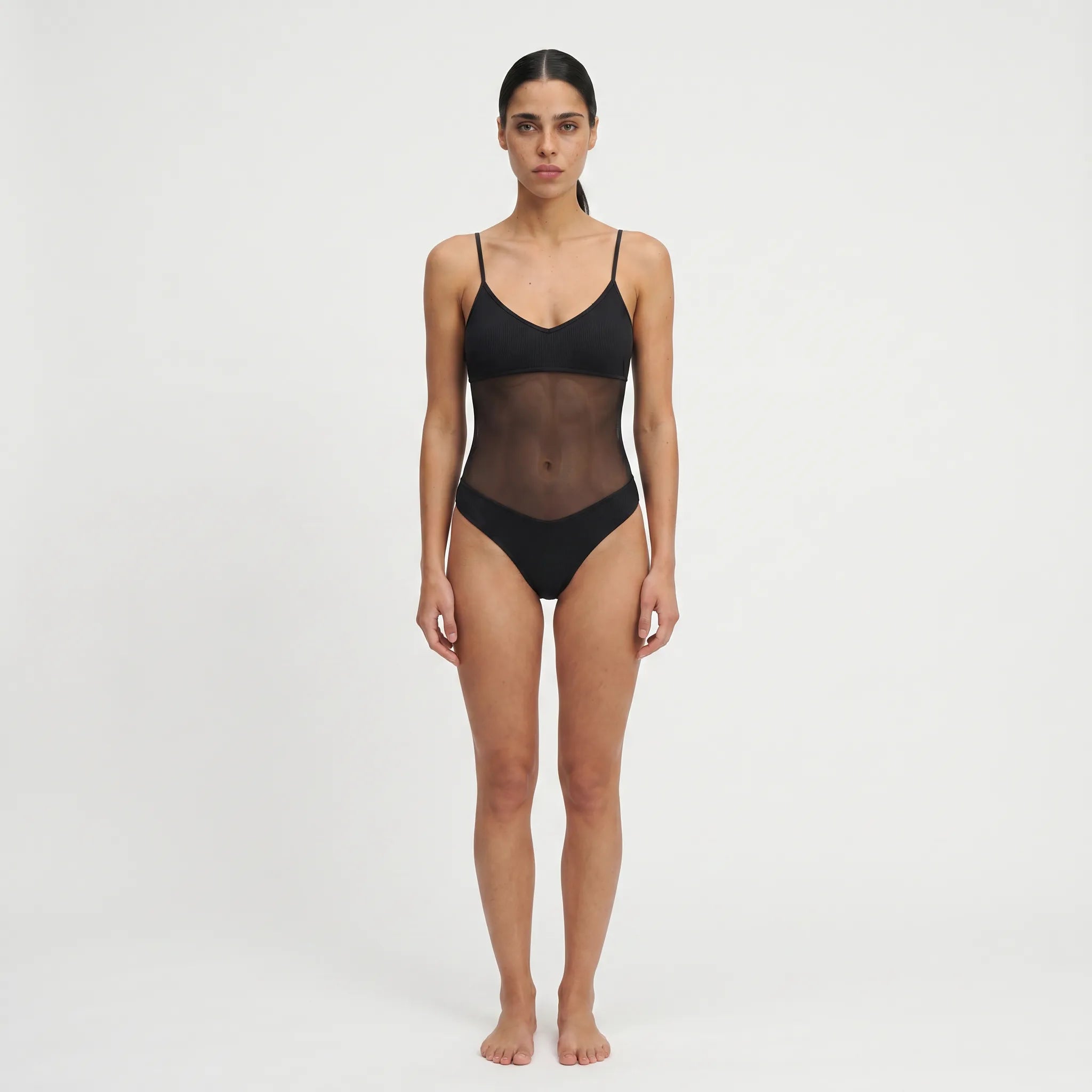 TWO TANNED – Tan-Through One-Piece