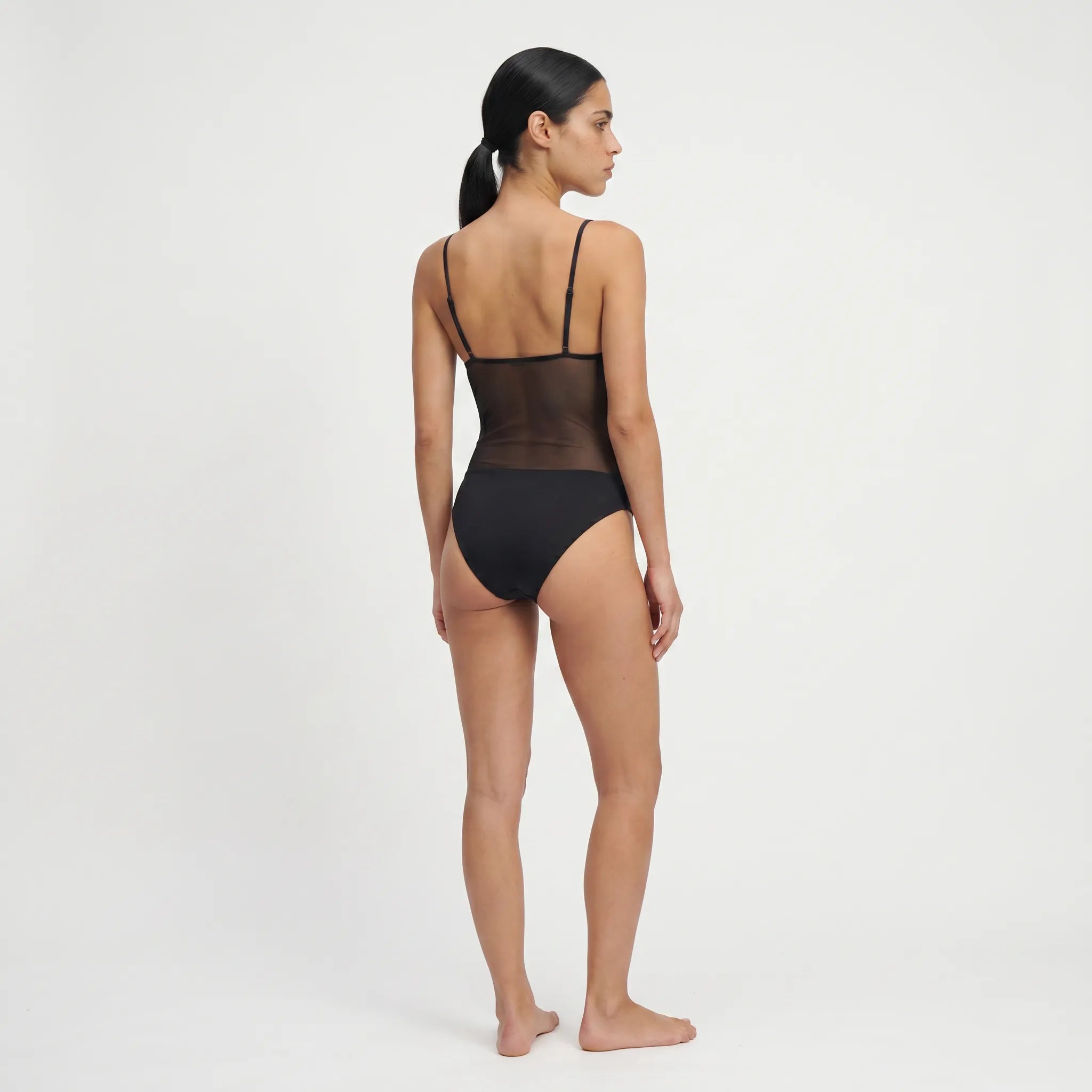 TWO TANNED – Tan-Through One-Piece