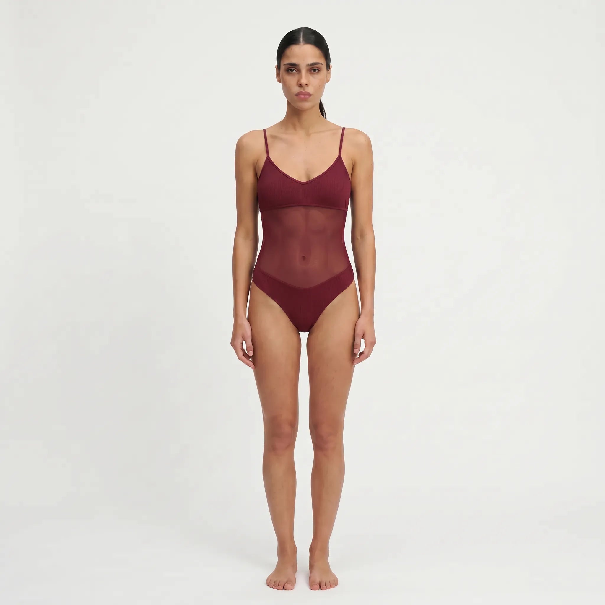 TWO TANNED – Tan-Through One-Piece