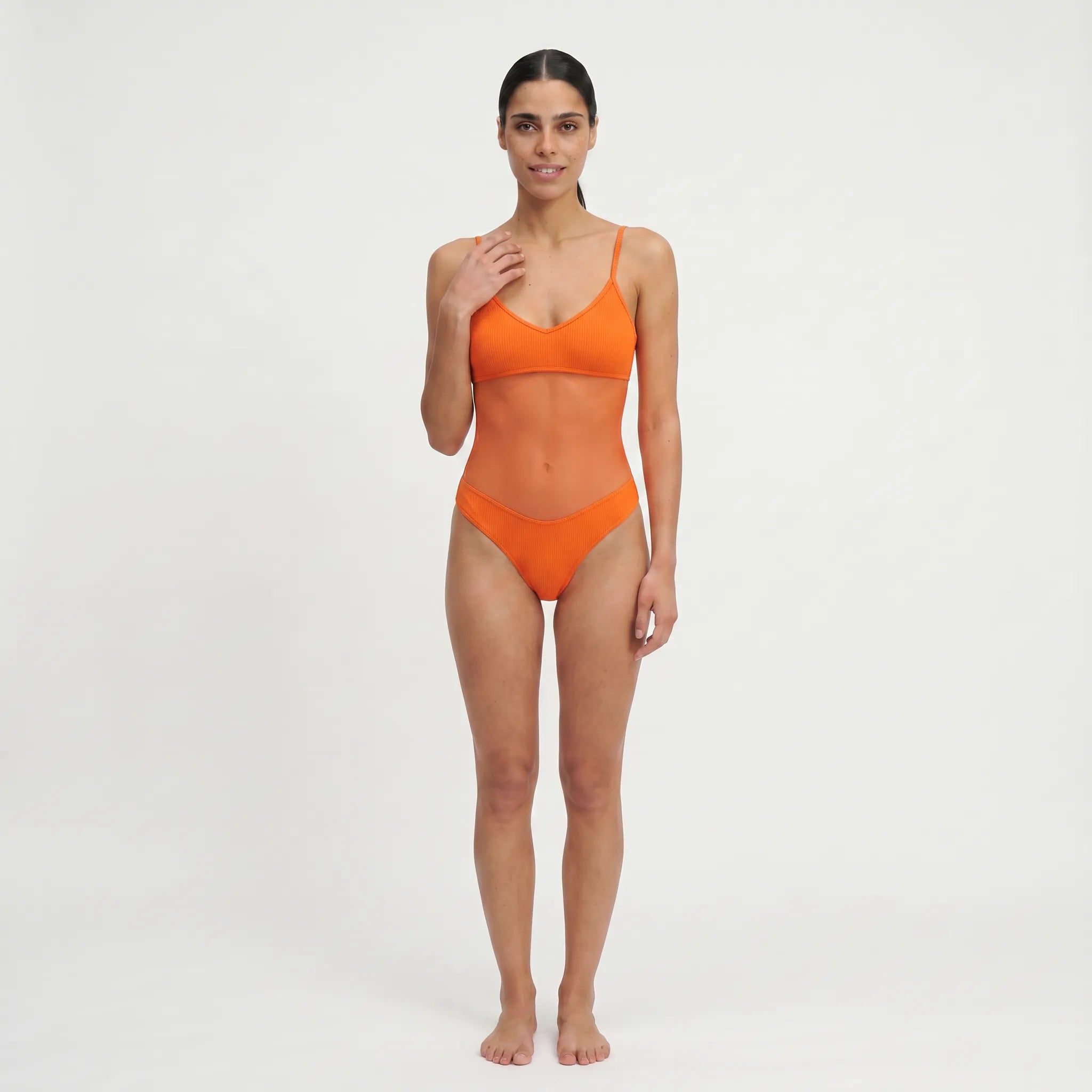 TWO TANNED – Tan-Through One-Piece